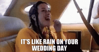A Woman Is Sitting In The Back Seat Of A Car Eating Ice Cream And Talking On A Cell Phone . GIF