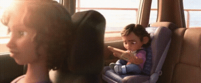 A Woman Is Sitting In The Back Seat Of A Car With A Baby In A Car Seat . GIF