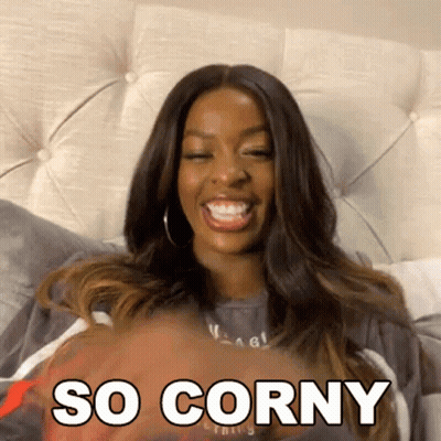 A Woman Is Sitting On A Bed With Her Eyes Closed And The Words So Corny Written On Her Face GIF