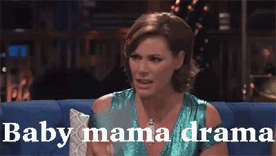 A Woman Is Sitting On A Blue Couch With The Words Baby Mama Drama Written On The Bottom GIF