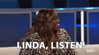 A Woman Is Sitting On A Couch And Says " Linda Listen " GIF