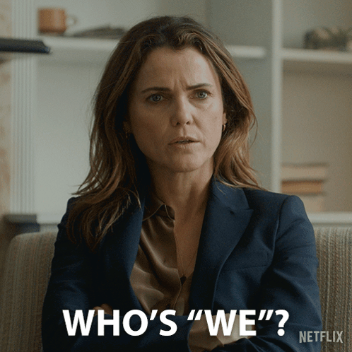 A Woman Is Sitting On A Couch And Says Who 'S We GIF