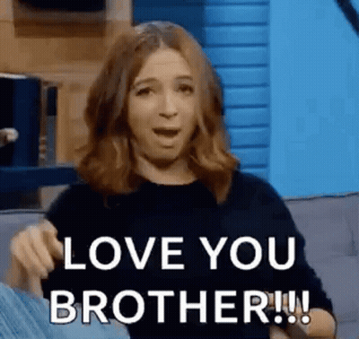 A Woman Is Sitting On A Couch Making A Funny Face And Saying `` I Love You Brother '' . GIF