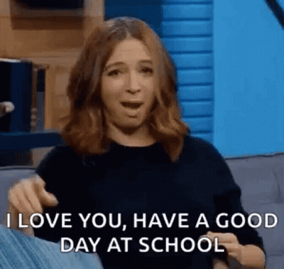 A Woman Is Sitting On A Couch Saying `` I Love You , Have A Good Day At School '' GIF