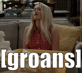 A Woman Is Sitting On A Couch With A Basket That Says ' Igroans ' On It GIF