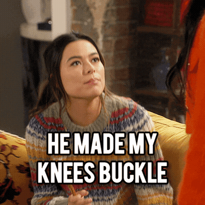 A Woman Is Sitting On A Couch With A Caption That Says He Made My Knees Buckle GIF