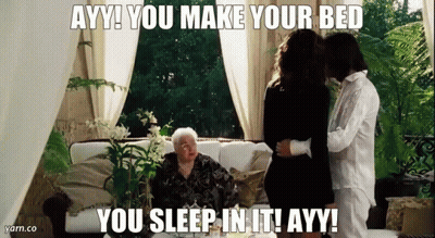 A Woman Is Sitting On A Couch With A Man And A Woman . GIF