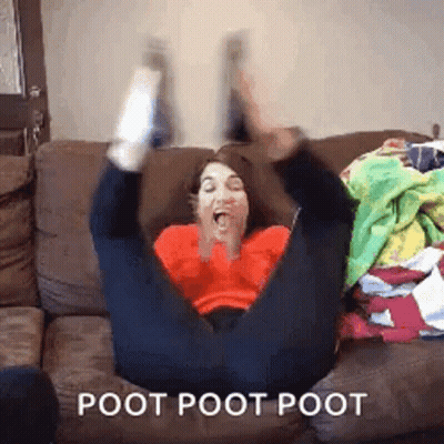 A Woman Is Sitting On A Couch With Her Legs In The Air And The Caption Poot Poot Poot . GIF