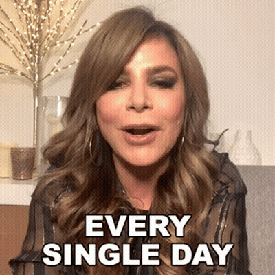 A Woman Is Sitting On A Couch With The Words Every Single Day Written On Her Face GIF