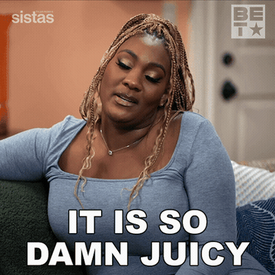 A Woman Is Sitting On A Couch With The Words It Is So Damn Juicy GIF