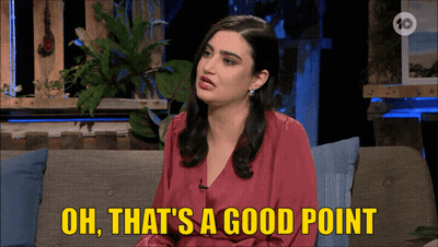 A Woman Is Sitting On A Couch With The Words Oh That 'S A Good Point GIF