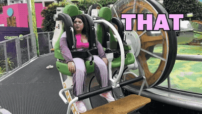 A Woman Is Sitting On A Roller Coaster With The Words That Written Above Her GIF