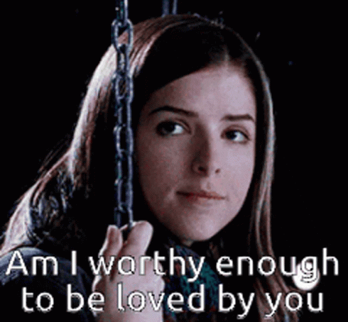 A Woman Is Sitting On A Swing With The Words " Am I Worthy Enough To Be Loved By You " Written Below Her GIF