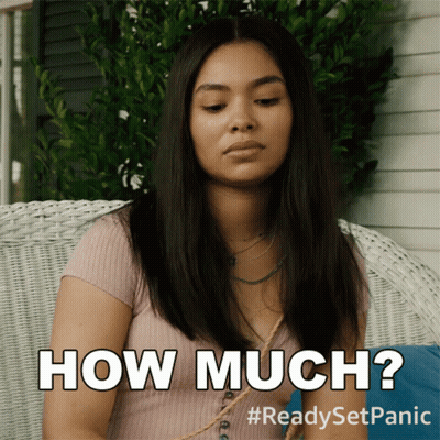 A Woman Is Sitting On A Wicker Chair With The Words How Much On Her Face GIF