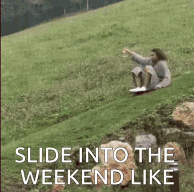 A Woman Is Sliding Down A Hill With The Words Slide Into The Weekend Like GIF