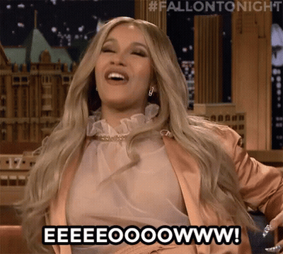 A Woman Is Smiling And Saying Eeeeooowww . GIF