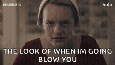 A Woman Is Smiling And Saying `` The Look Of When I 'M Going To Blow You '' . GIF