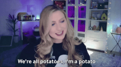 A Woman Is Smiling And Saying We 'Re All Potatoes . I 'M A Potato . GIF