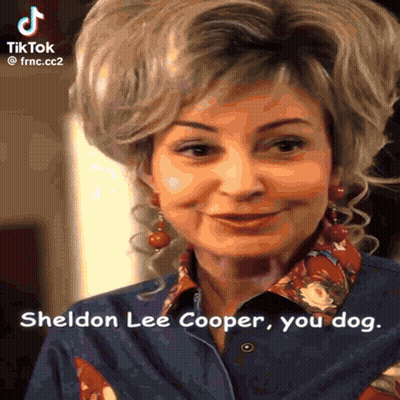 A Woman Is Smiling And Says Sheldon Lee Cooper Your Dog GIF