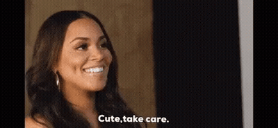 A Woman Is Smiling And Talking About Taking Care Of Herself . GIF