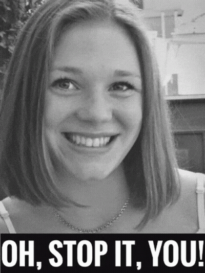 A Woman Is Smiling In A Black And White Photo With The Words Oh Stop It You GIF