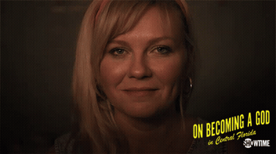 A Woman Is Smiling In A Showtime Ad For On Becoming A God In Central Florida GIF