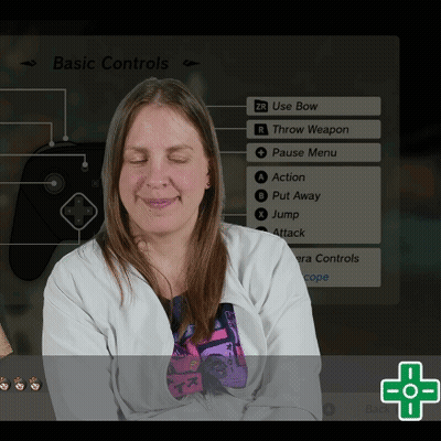 A Woman Is Smiling In Front Of A Screen That Says " Basic Controls " On It GIF