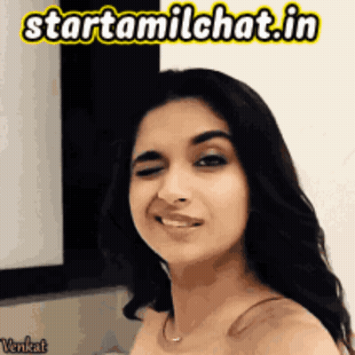 A Woman Is Smiling In Front Of A Sign That Says Startamilchat.in GIF