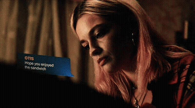 A Woman Is Smiling While Looking At A Message That Says Otis Hope You Enjoyed The Sandwich GIF