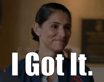 A Woman Is Smiling With The Words I Got It Written On Her Face . GIF