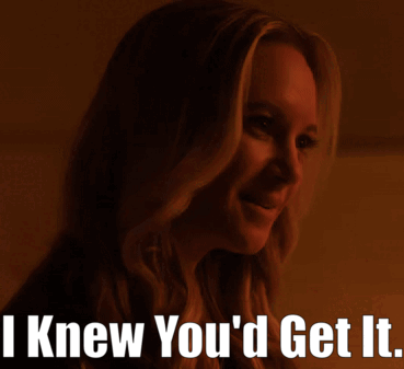 A Woman Is Smiling With The Words I Knew You 'D Get It GIF
