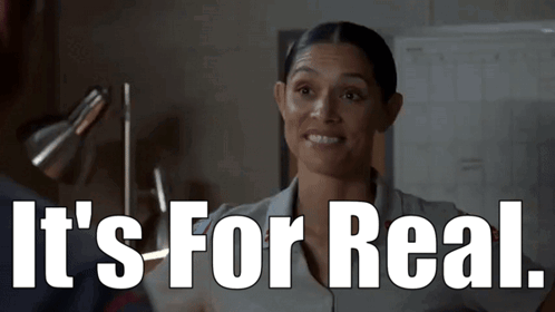 A Woman Is Smiling With The Words It 'S For Real Written Below Her GIF
