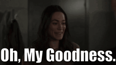 A Woman Is Smiling With The Words Oh My Goodness Below Her GIF