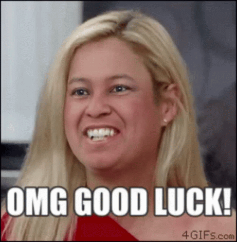 A Woman Is Smiling With The Words " Omg Good Luck " On Her Face GIF