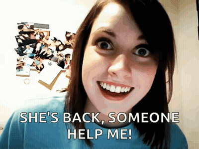 A Woman Is Smiling With The Words She 'S Back Someone Help Me Below Her GIF