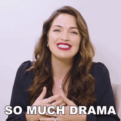 A Woman Is Smiling With The Words So Much Drama Written Below Her GIF