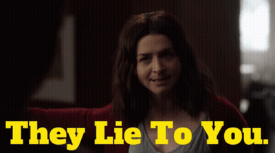A Woman Is Smiling With The Words They Lie To You Below Her GIF