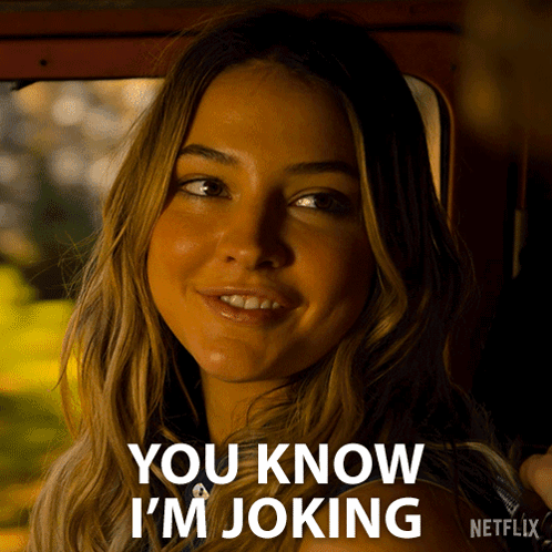 A Woman Is Smiling With The Words You Know I 'M Joking Behind Her GIF