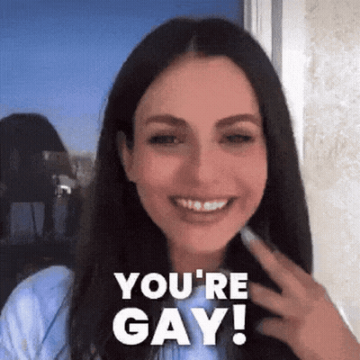 A Woman Is Smiling With The Words You 'Re Gay On Her Face GIF