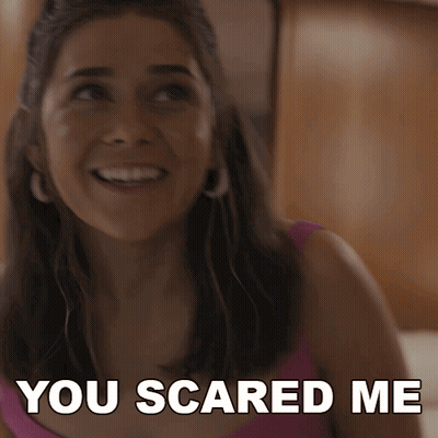 A Woman Is Smiling With The Words You Scared Me Written Below Her GIF