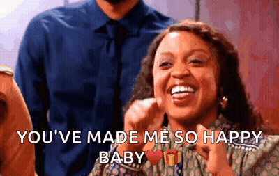 A Woman Is Smiling With The Words You 'Ve Made Me So Happy Baby GIF