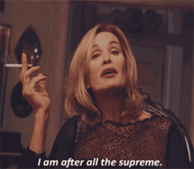 A Woman Is Smoking A Cigarette And Says I Am After All The Supreme GIF
