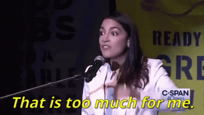 A Woman Is Speaking Into A Microphone With The Words That Is Too Much For Me Behind Her GIF
