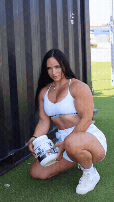 A Woman Is Squatting Down Holding A Container That Says ' Muscle Milk ' On It GIF