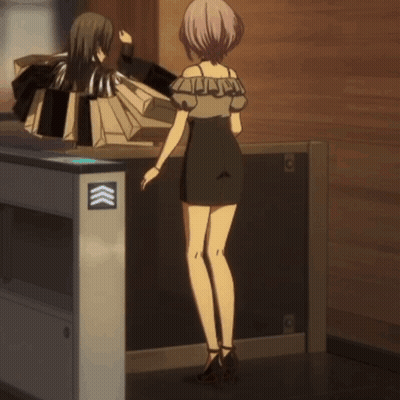 A Woman Is Squatting Down In Front Of A Machine That Has Three Arrows Pointing Up GIF