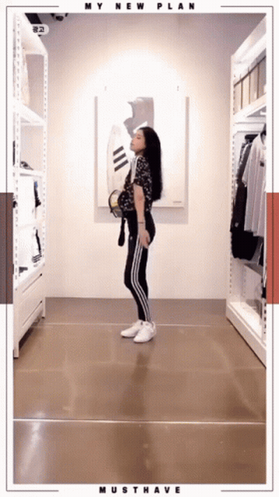 A Woman Is Standing In A Closet With The Words My New Plan Must Have On The Bottom GIF