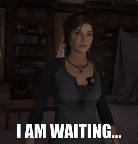 Woman Standing In Dark Room Waiting GIF