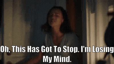 A Woman Is Standing In A Dark Room With The Words Oh This Has Got To Stop I 'M Losing My Mind . GIF