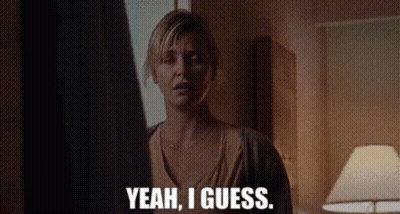A Woman Is Standing In A Room And Says Yeah I Guess . GIF