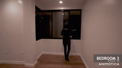 A Woman Is Standing In A Room With The Words Bedroom 3 Made In Animotica On The Bottom GIF